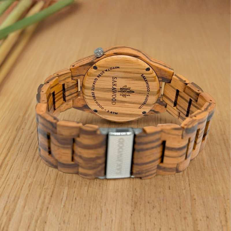 Flat lay back dial of Sakawood “Australia?” Roman watch — symbolizing Sakawood’s sustainable watch design and one-tree-per-order reforestation mission.